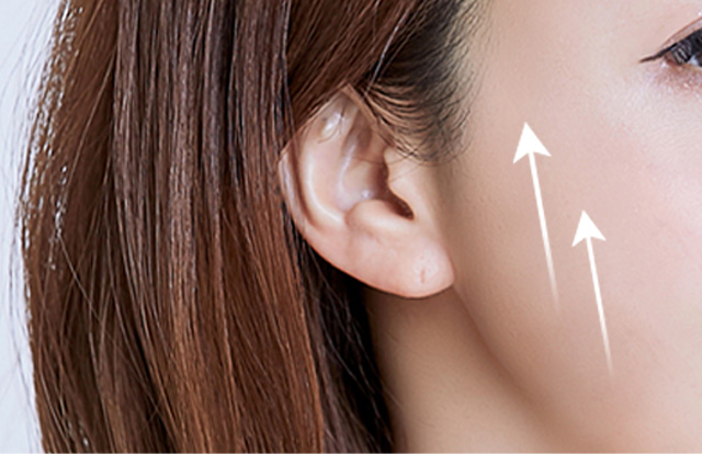 POINT 03 ดึงในแนวตั้งเพื่อยกกระชับแนวกรามและแก้ม